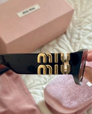 Gafas Miu Miu - Negras y Doradas