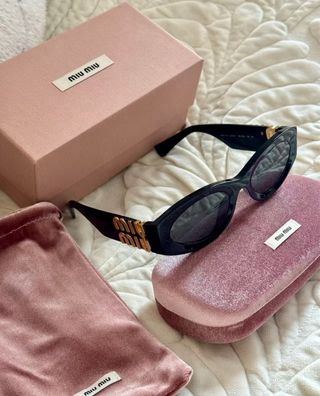 Gafas Miu Miu - Negras y Doradas