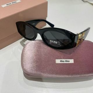 Gafas Miu Miu - Negras y Doradas