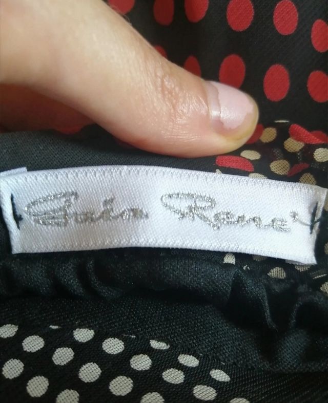 Gonna lunga asimmetrica a pois XL