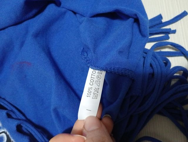 Top estivo vintage blu con frange