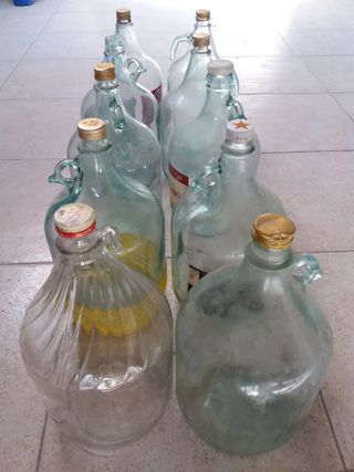 10 bottiglie (damigiane) in vetro da 5 litri cad.