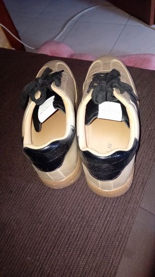 Sneakers oro e nero n.40