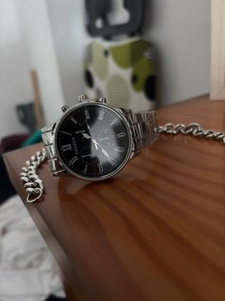 Reloj color plata y brazalete