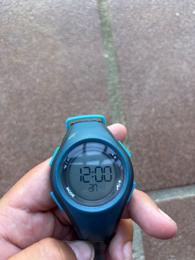 Reloj deportivo negro y verde agua