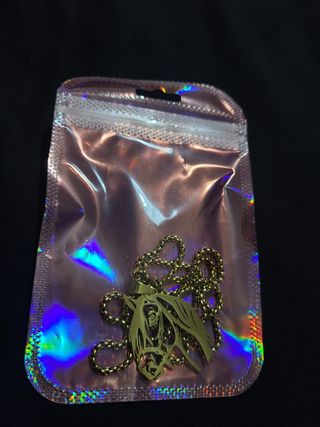 Collar con dije de caballo dorado