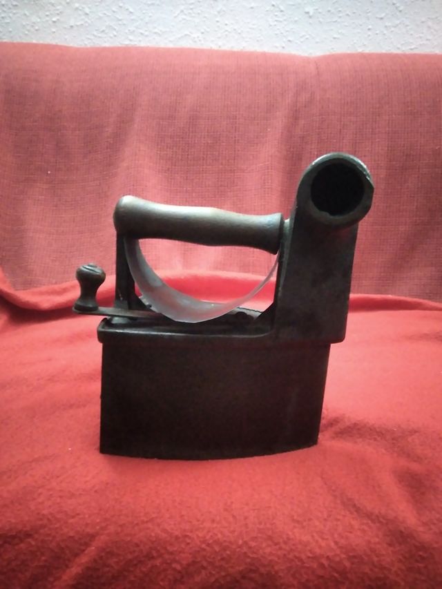 Plancha antigua de carbón