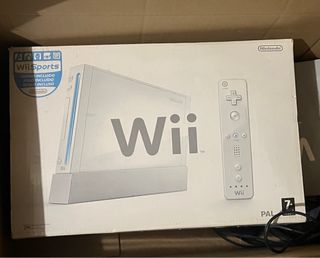 Wii + Wii Fit (Nintendo) + 2 juegos.