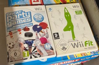 Wii + Wii Fit (Nintendo) + 2 juegos.