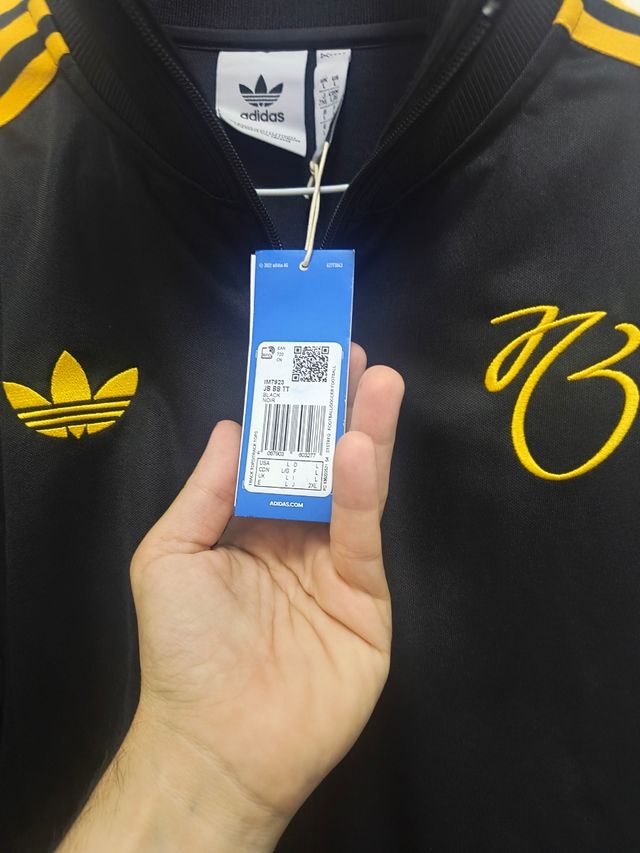 Chaqueta Adidas Beckenbauer negra y dorada