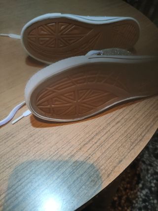 Botines plateados brillantes
