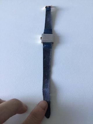Reloj Tissot dorado y azul