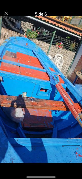 Vendo barco de madera fibrado por fuera