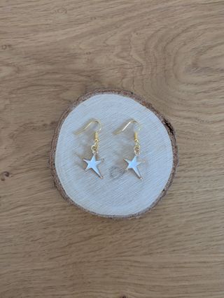 Pendientes estrella oro blanco