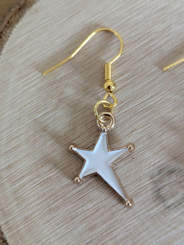 Pendientes estrella oro blanco