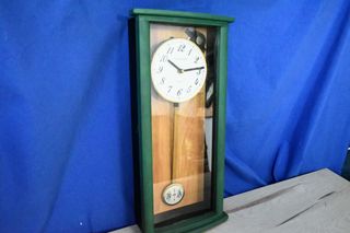 Reloj Longchamp madera con péndulo