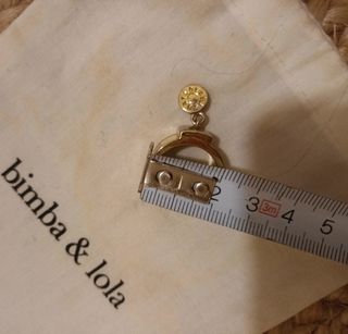 Anillo Bimba y Lola beige y dorado