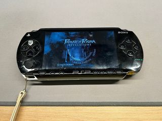 PSP Sony nera + Prince of Persia Revelations