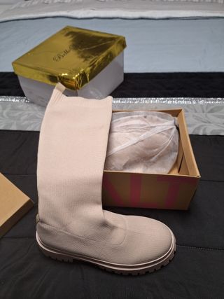 Botas altas beige de punto