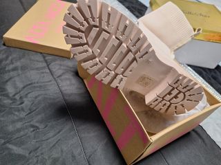 Botas altas beige de punto