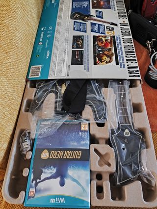 2 Guitarras Guitar Hero Live Wii U en su caja