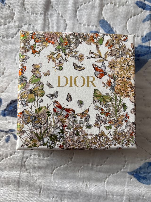 Pulsera Dior dorada y blanca