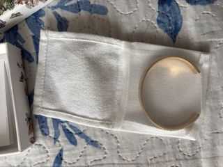 Pulsera Dior dorada y blanca