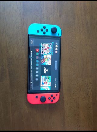 Nintendo Switch OLED + Juegos