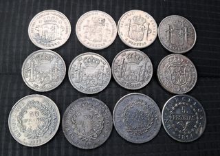 Lote 12 monedas réplicas o falsas. 