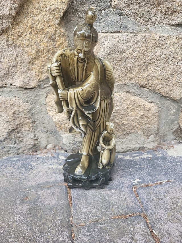 Estatuilla china antigua vela