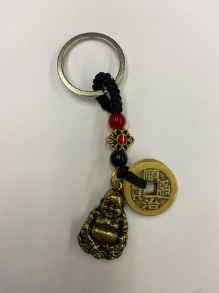 Llavero Buda chino con moneda