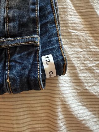 7 pantaloni bimbo + 2 corti (12 anni)