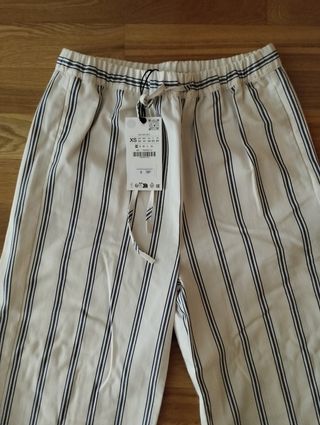 Pantalones rayas estilo pijama. Zara Woman 