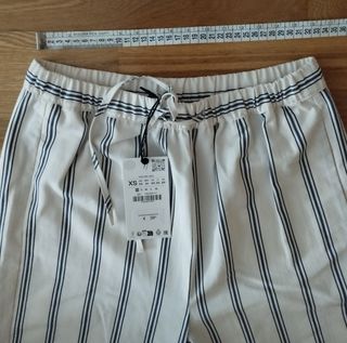 Pantalones rayas estilo pijama. Zara Woman 