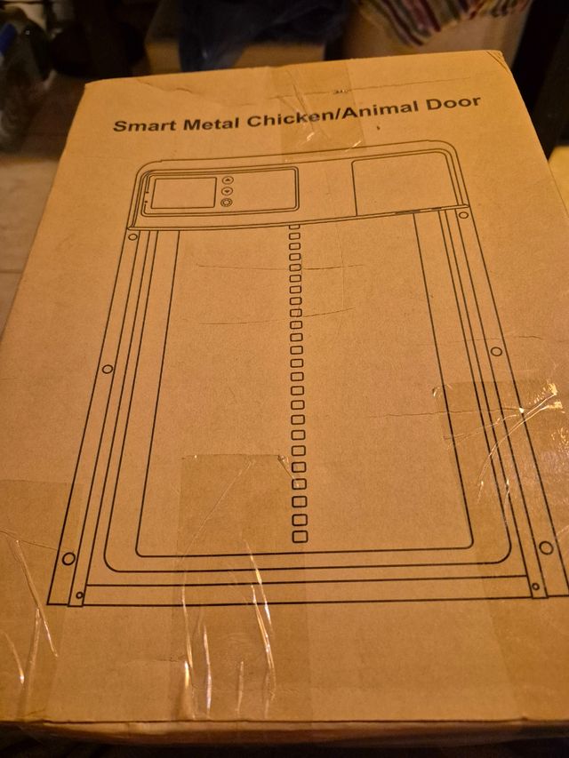 Puerta automática para pollitos