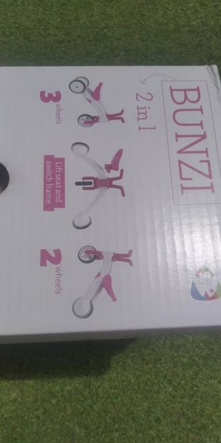 Triciclo infantil rosa y blanco