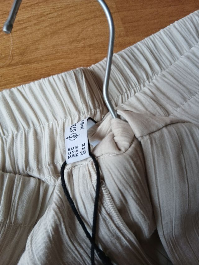 Pantalones Stradivarius beige anchos
