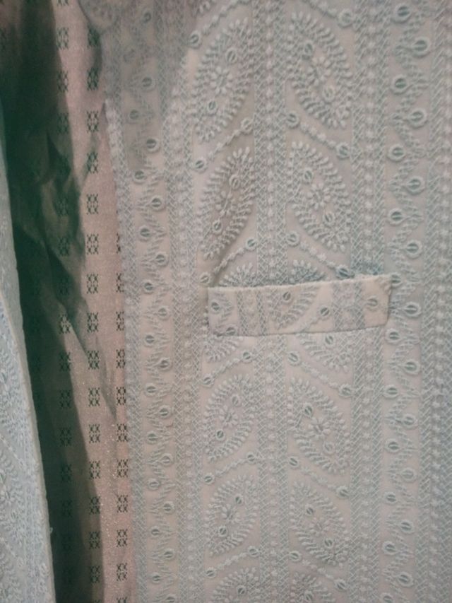 Chaleco tejido turquesa