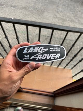 Emblema Land Rover con tara 