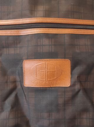 Valigia porta abiti nera e marrone