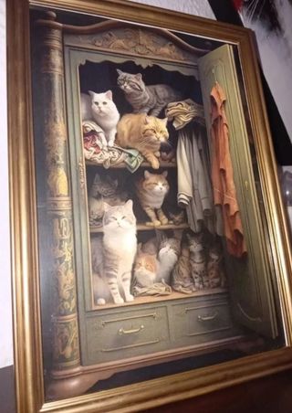 Gattino Quadro in un armadio vintage