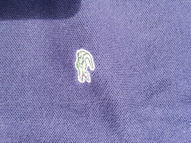 Polo Lacoste azul talla S PRECIO NEGOCIABLE 
