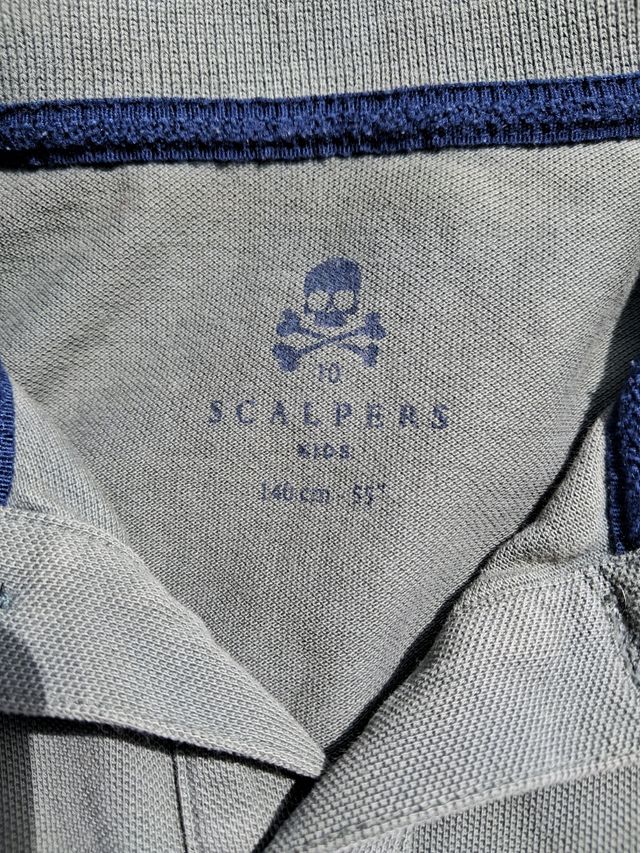 Polo Scalpers niño talla M PRECIO NEGOCIABLE 
