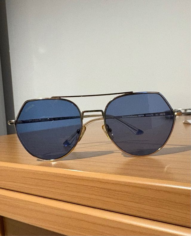 Occhiale da sole Unofficial con lente azzurra