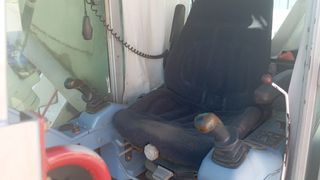 Retroexcavadora giratoria de cadenas