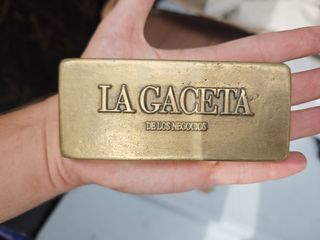 Lingote pisapapeles publicidad la Gaceta bronce 