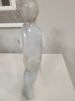 Pareja figuras porcelana pastor niño