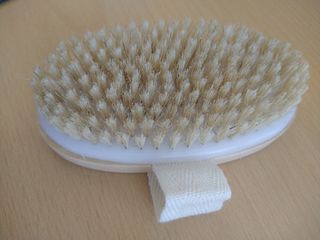 Spazzola corpo massaggiante bianca e beige