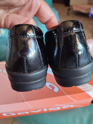 Scarpe Grunland nere con cinturino passante