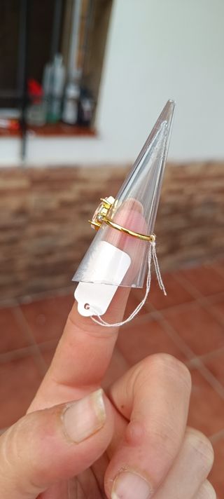 Anillo acero rosa con circonitas